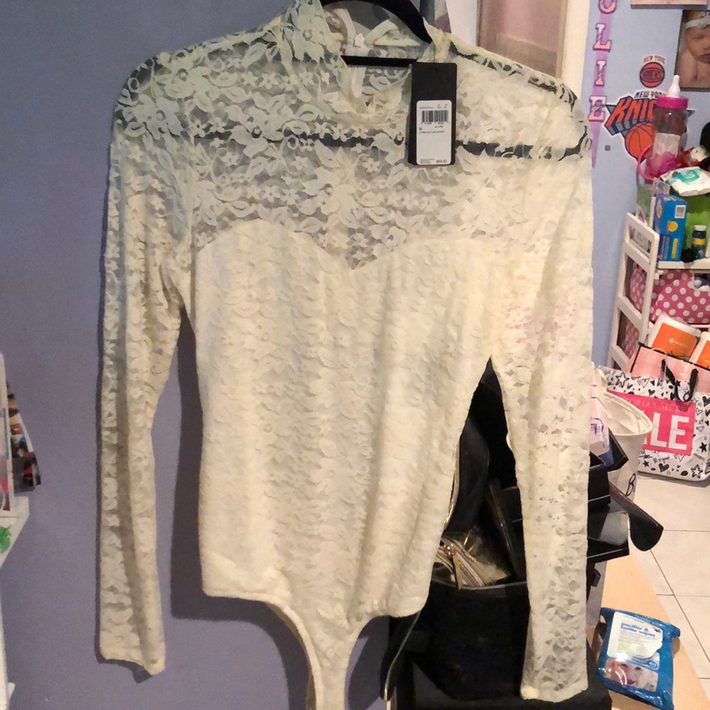 Brand new guess lace bodysuit !